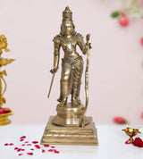 Brass Rama statue holding bow and arrow, stonework style base for home pooja