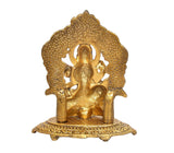 Back view of Saraswati Maa seated metal idol, gold tone, textured halo and base