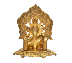 Back view of Saraswati Maa seated metal idol, gold tone, textured halo and base