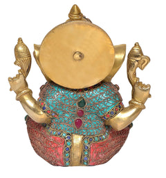 Ganesha brass idol back view, gold disc backplate, turquoise and red clothing