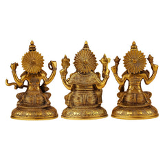 Brass Lakshmi Ganesha Saraswati idols, rear/side view with round halos