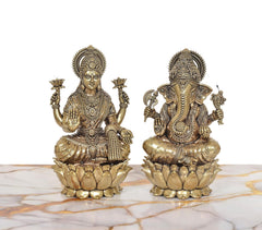Front view of brass Lakshmi & Ganesha statue set, 7 in, lotus bases