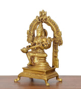 Side view brass Saraswati goddess idol holding veena, arched decorative back frame