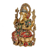 Brass Ganpati on lotus base, 12 in, side view, jeweled blue-red-green outfit and crown