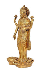 Lakshmi brass standing idol, front view, circular halo and ornate seated-lotus base