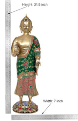Brass Buddha statue shown with ruler: height 21.5 in, green robe with red trim