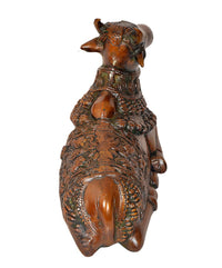 AONA Brass Nandi bull statue side/back view, ornate saddle and carved torso
