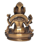 Rear view of seated Ganesha idol on round lotus base, brass finish, detailed back