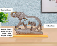 Resin elephant with baby showpiece, gray color, 7 in height on golden base