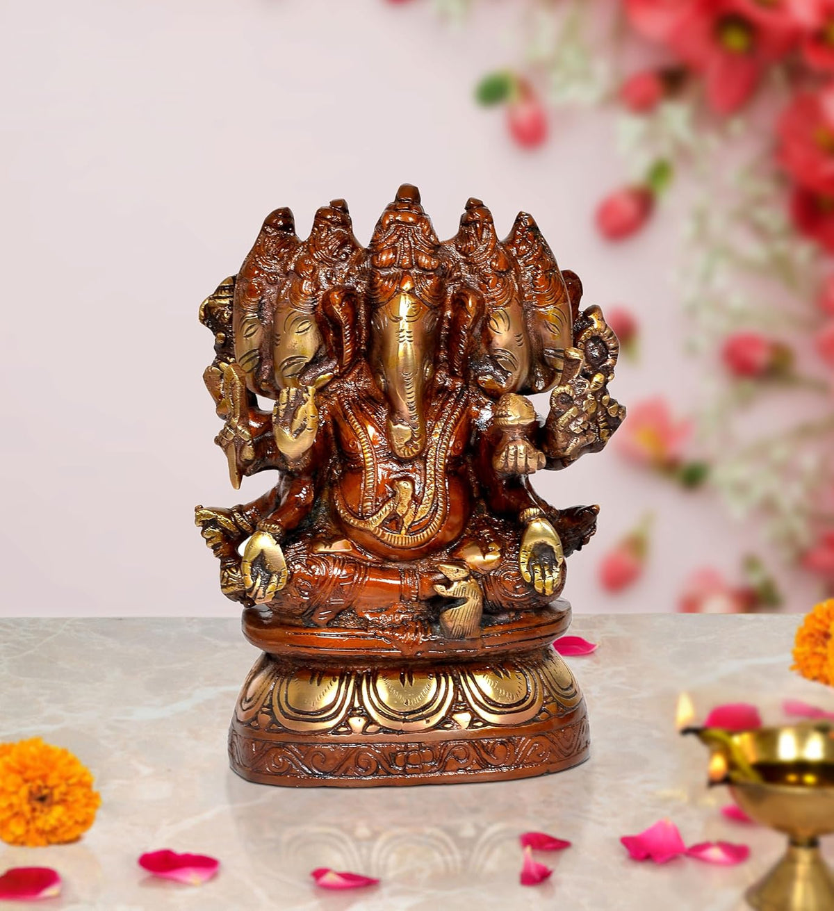 Brass Panchmukhi Ganesha idol, five faces, seated, ornate base, 8-inch