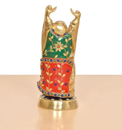 Brass laughing Buddha statue angled view, green top and red bottom with blue accents