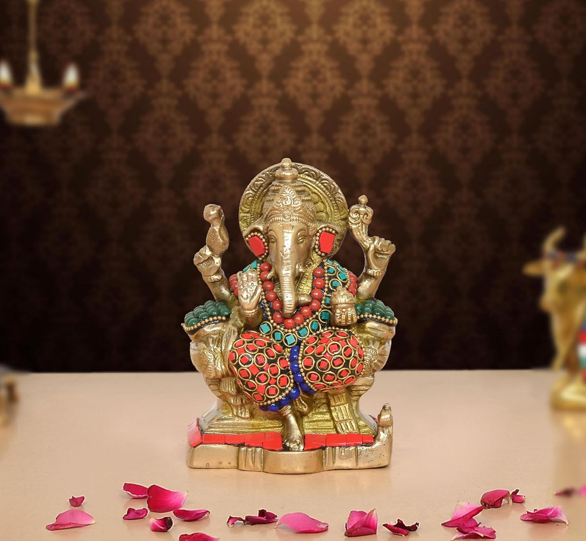 Brass Ganesha statue, seated with multicolor beaded ornaments and jeweled red outfit