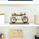Gold iron bike decorative statue with spoked wheels, 8 inches tall