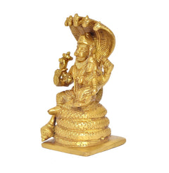 Gold brass Lakshmi Narasimha statue, side view with raised right arm and base