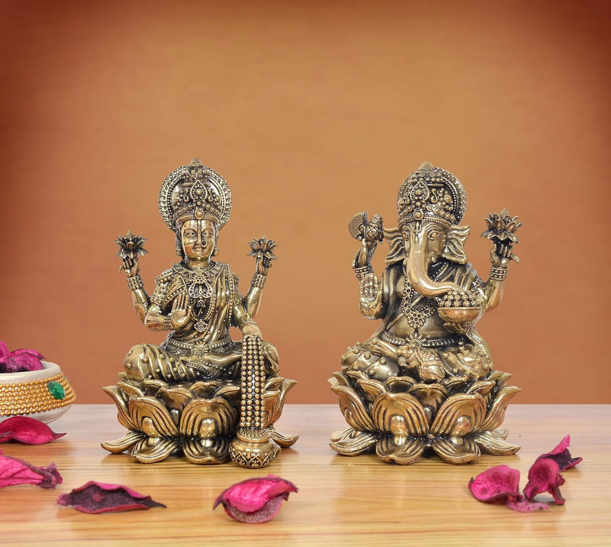 Brass Hindu deity idol pair: Lakshmi seated on lotus left, Ganesha seated on lotus right
