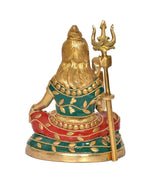 Brass Shiva murti rear/side view, trident and red-green patterned skirt with gold detailing