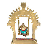 Brass swing statue idol with hollow arch and hanging Ganesha inside, front view