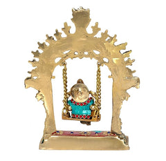 Brass swing statue idol with hollow arch and hanging Ganesha inside, front view
