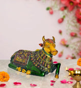 AONA brass Nandi bull seated statue, green body with ornate multicolor back detailing