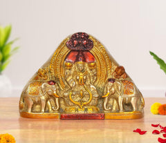Brass Gaja Lakshmi idol with elephant attendants, seated in arched halo