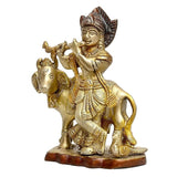 Brass Krishna on cow idol figurine, ornate crown and jewelry, 5-inch