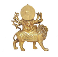 Back view of Brass Durga Maa on lion, circular halo and carved backplate