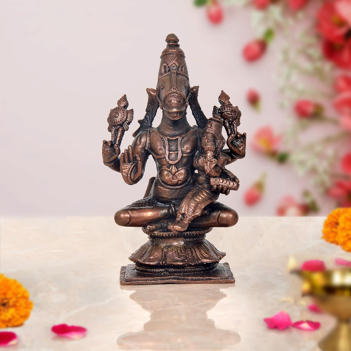 Copper Vishnu avatar statue, seated multi-armed with Lakshmi, 5 inch