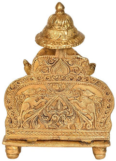 Brass Ganesha idol statue backrest with detailed engravings and canopy top