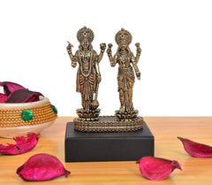 Brass twin deities idol, Lakshmi and Vishnu, front view with detailed jewelry