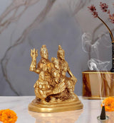 Brass Shiva Parivar idol statue, three-quarter view with central deity and seated figures