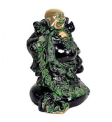 Laughing Buddha statue, gold head and green accents on dark robe, seated side view