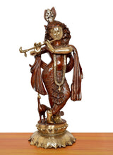 Krishna idol playing flute, ornate crown and flowing robe details, standing on pedestal