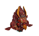 Garuda face wall hanging mask statue angled view, gold horns over red textured hair