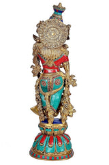 Brass Radha Krishna sculpture, rear view with ornate halo and teal/red garment