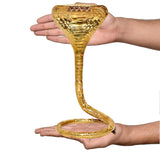 Copper naag for shivling pooja stand, shown in hands; cobra hood and base ring.