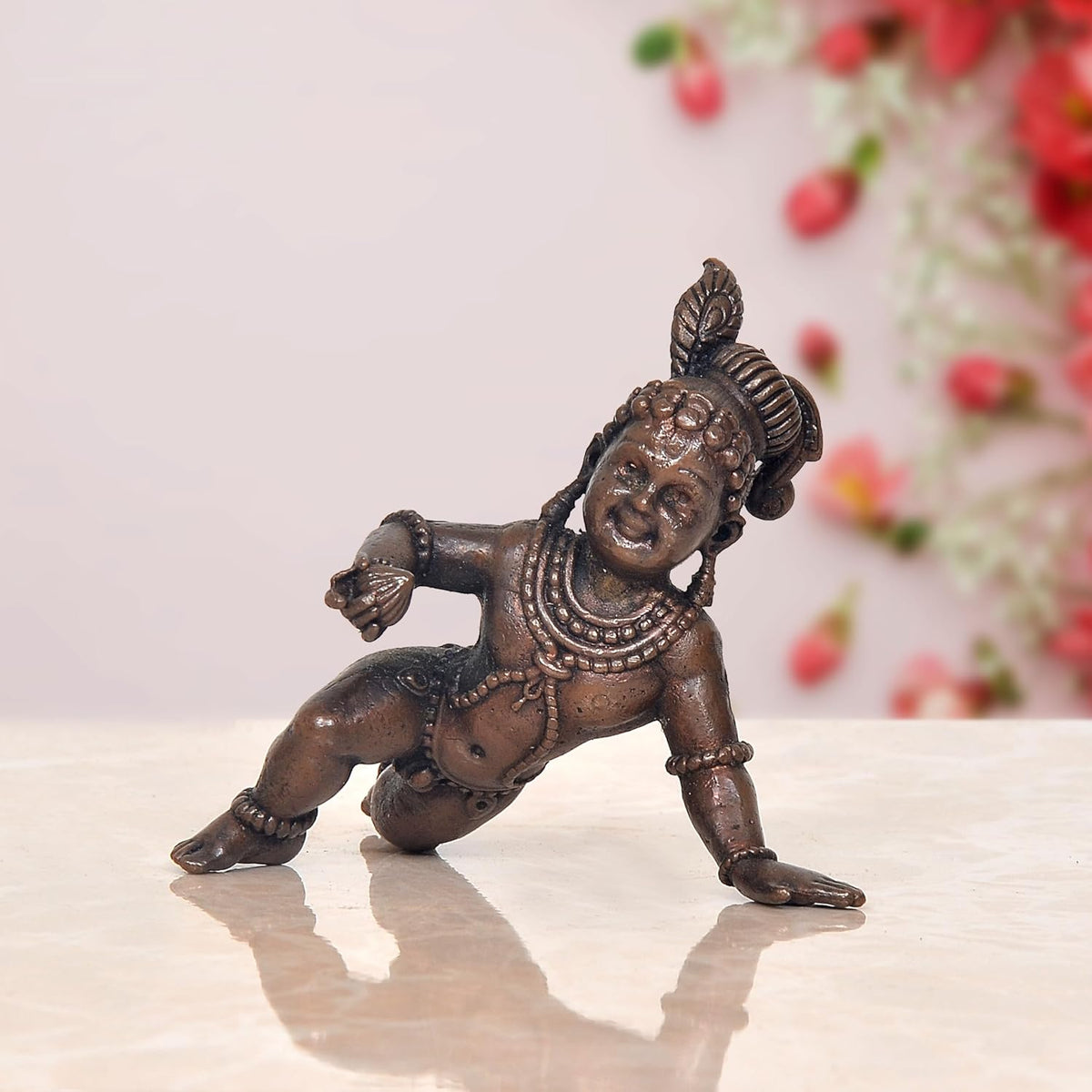 Bal Gopal Krishna laddu idol, kneeling pose, dark copper finish