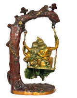 Brass Radha Krishna swing idol statue, rear view with hanging swing ropes