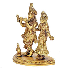 Brass Radha-Krishna idol statue, side view of two figures on round decorative base