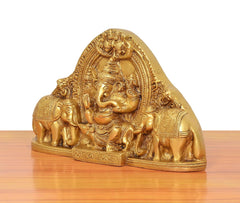 Brass Gaja Ganesha idol with elephants, side angle, golden finish