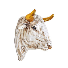 Bull head wall hanging profile with gold horns, detailed white and brown speckled texture