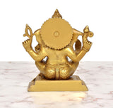 Brass seated Lord Ganesha statue, golden finish, rear view of back plaque