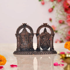 Copper idol rear view with two standing deities in arched frames, 2-inch