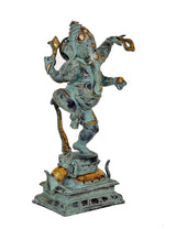 Dancing Ganesha idol statue, turquoise patina with gold trim, detailed pedestal