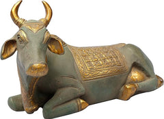 Brass Shiva Nandi statue, gold engraved saddle, bowed head, horn details