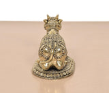 Brass seated Nandi statue rear view with crown and ornate lower base