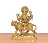 Brass Durga Maa statue on lion, golden finish, isolated side front
