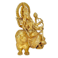 Brass Durga Maa on lion, angled view showing trident and halo