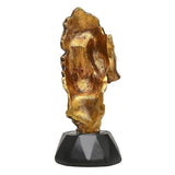 Gold polyresin human face sculpture, back view, black pedestal base
