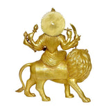 Brass Durga statue on lion, back view with halo and weapons