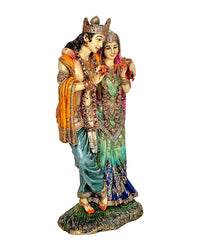 Radha-Krishna idol statue, close embrace pose with ornate crowns and jewelry